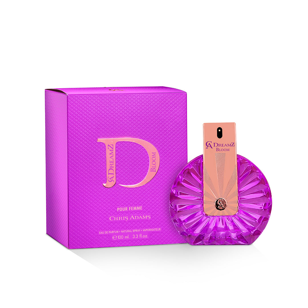 Purple perfume bottle and packaging with 'Dreamz' logo on a white background