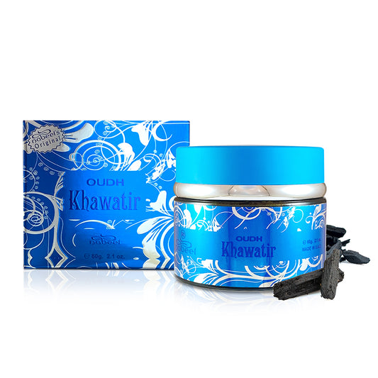 Blue and white Oudh Khawair container with packaging on a white background