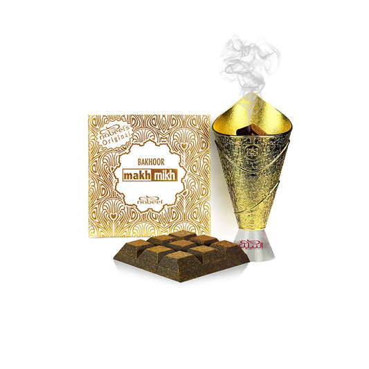 Makh Mikh bakhoor with packaging and burner on a white background