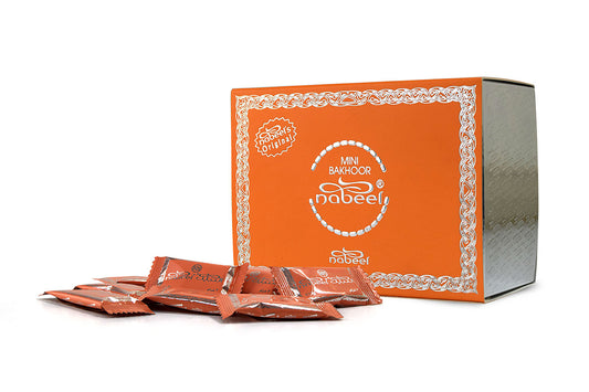 Orange box of Nabeel bakhoor with multiple packets for display on a white background