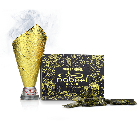 Gold mini bakhoor cone and packaging with 'Nabeel' branding on a white background