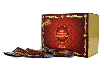 Red and gold box of Mini Bahoor Nasaem with individual packets on a white background