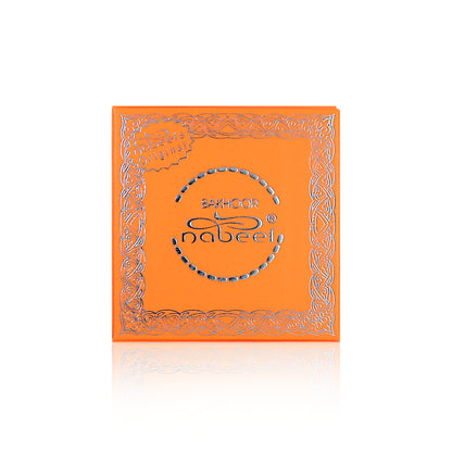 Orange box with silver decorative elements and 'Bakhoor Nabeel' branding on a white background
