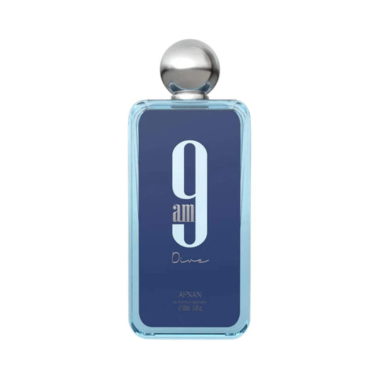 A rectangular glass perfume bottle with a metallic silver spherical cap, featuring a dark blue front label with the text '9 am am Dive' and 'AFNAN' at the bottom, set against a plain white background.