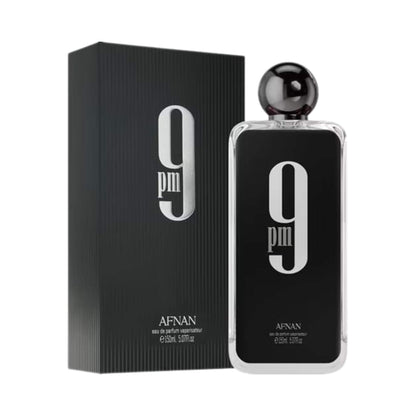 Afnan 9pm Eau de Parfum bottle and its black textured packaging box, featuring a prominent silver '9PM' logo on a white background.