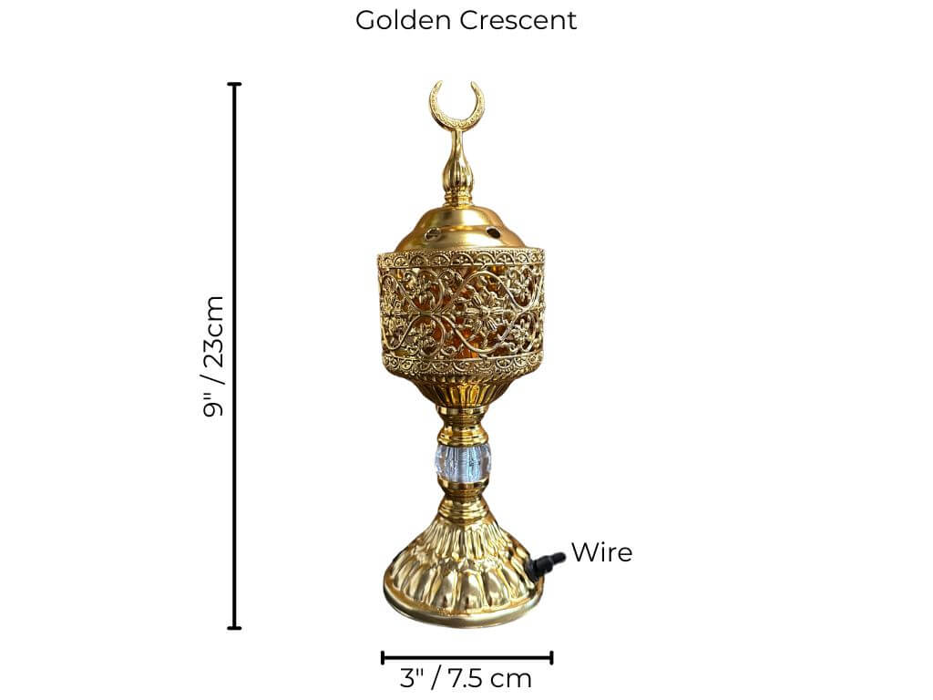 Decorative golden bakhoor burner with crescent symbol and measurements on a white background