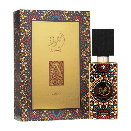 A bottle of Ajwad Lattafa perfume next to its ornate packaging box. The bottle has a black cap and a gold-toned body decorated with intricate multicolor geometric patterns, while the box features a large gold center panel framed by the same detailed border.