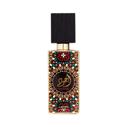 A bottle of Ajwad Lattafa perfume. The bottle has a black cap and a gold-toned body decorated with intricate multicolor geometric patterns.