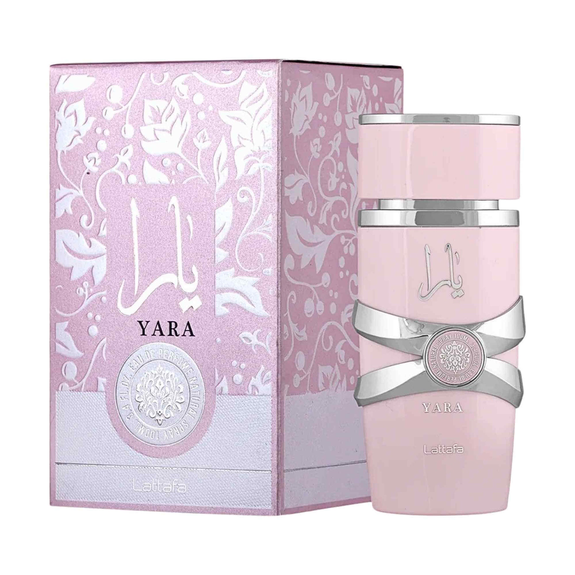 Pink Yara perfume bottle with silver accents and matching box on a white background