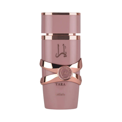Lattafa Yara Elixir perfume bottle on a white background. Amani Manor
