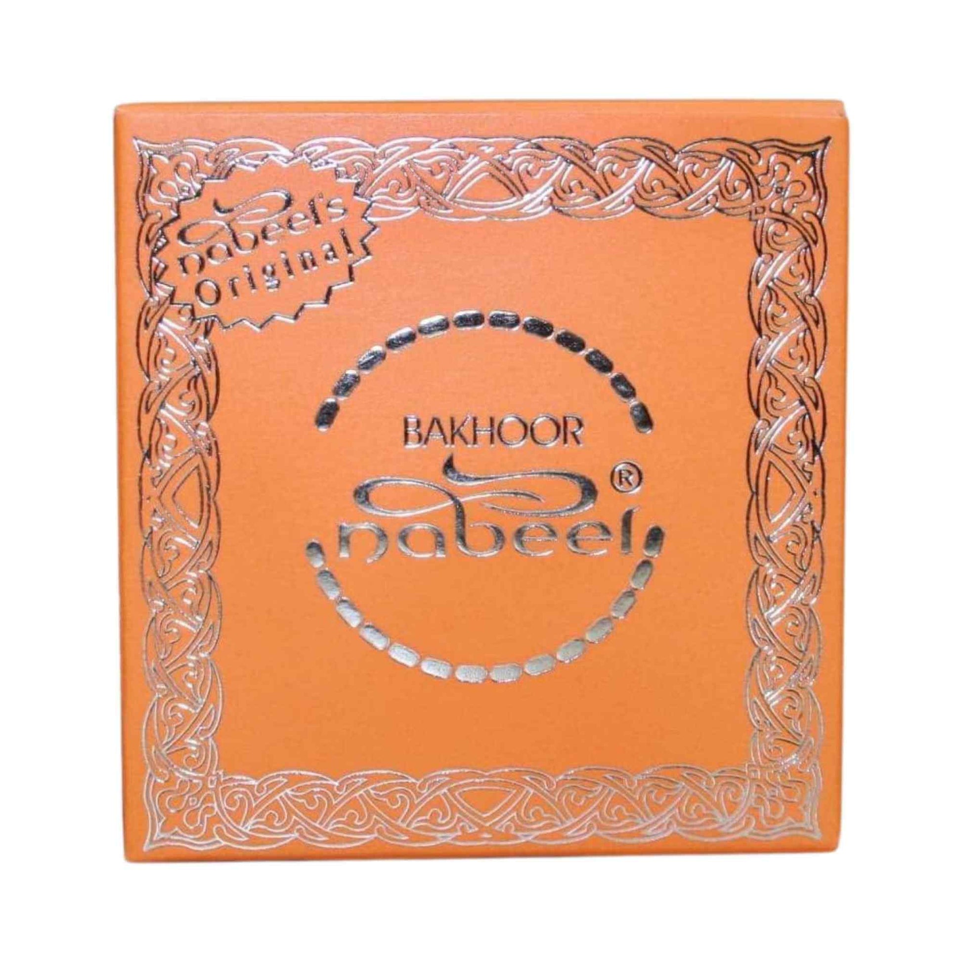 Orange box with silver intricate design and 'Bakhoor Nabeel' branding on a white background