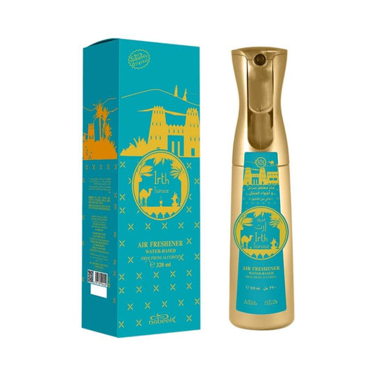 On the left, a box with Nabeel and Irth Fairooz branding. On the right, a gold air freshener bottle with turquoise sticker that has Nabeel and Irth Fairooz branding on a white background.