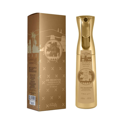 A bottle and matching box of Irth Gold water based air freshener featuring a gold design with desert-themed illustrations, shown on a plain white background.