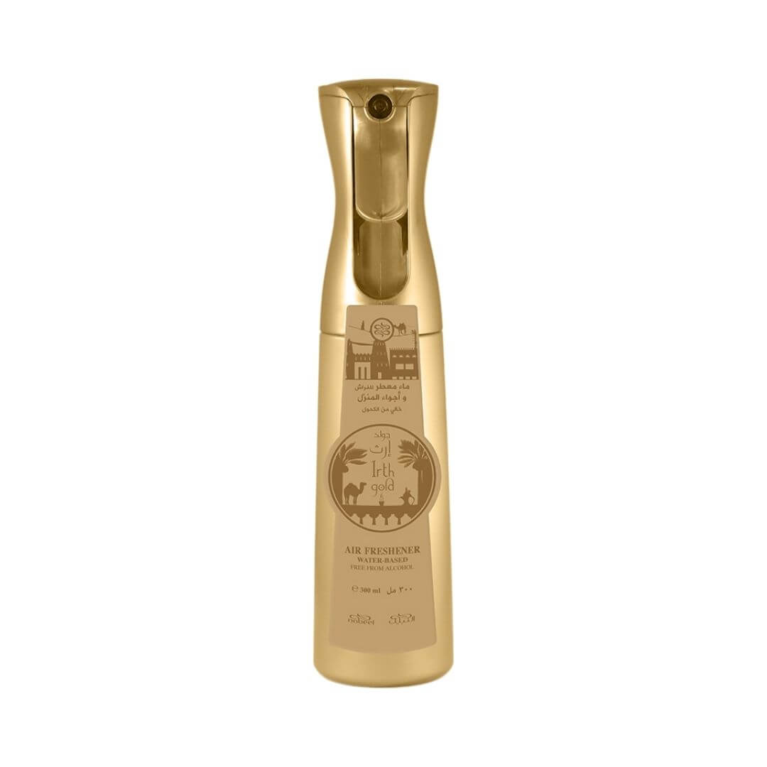 A bottle of Irth Gold water based air freshener featuring a gold design with desert-themed illustrations, shown on a plain white background.