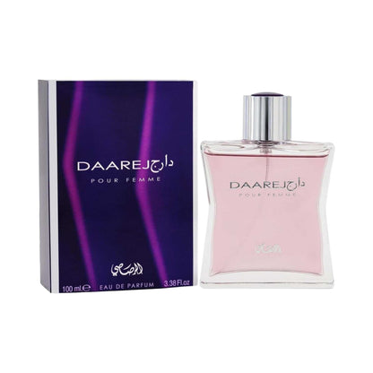 Rasasi Daarej Pour Femme Eau de Parfum 100ml featuring the purple retail box with silver side panels beside the pink glass perfume bottle on a white background.