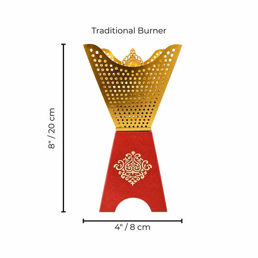 A traditional metal bakhoor burner shown on a white background with dimension labels indicating a height of 8 inches (20 cm) and a base width of 4 inches (8 cm). The burner has a gold upper section and a red lower section with a gold ornamental pattern.