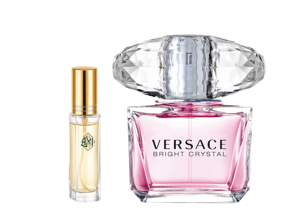 Versace perfume bottle with a smaller gold bottle on a white background